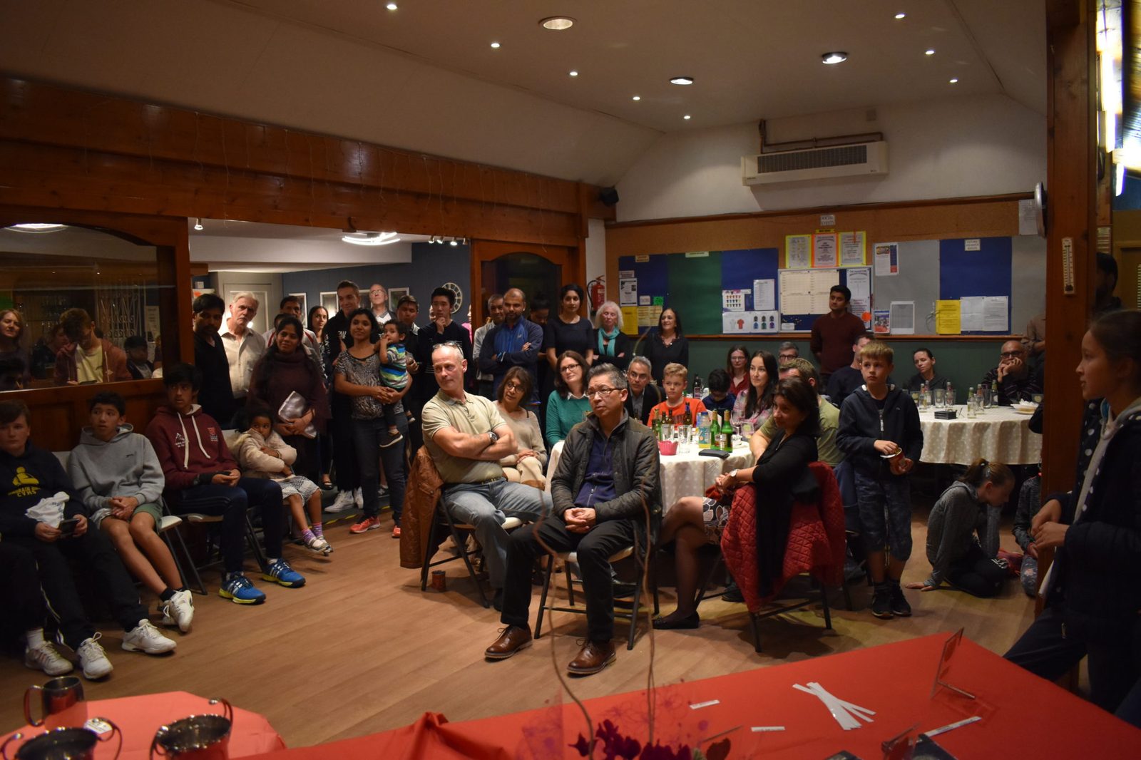 Members and families filling the clubhouse at Headstone Tennis Club on a presentation evening